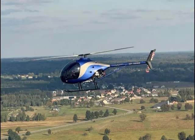 ARGO AH Helicopter in flight - side view